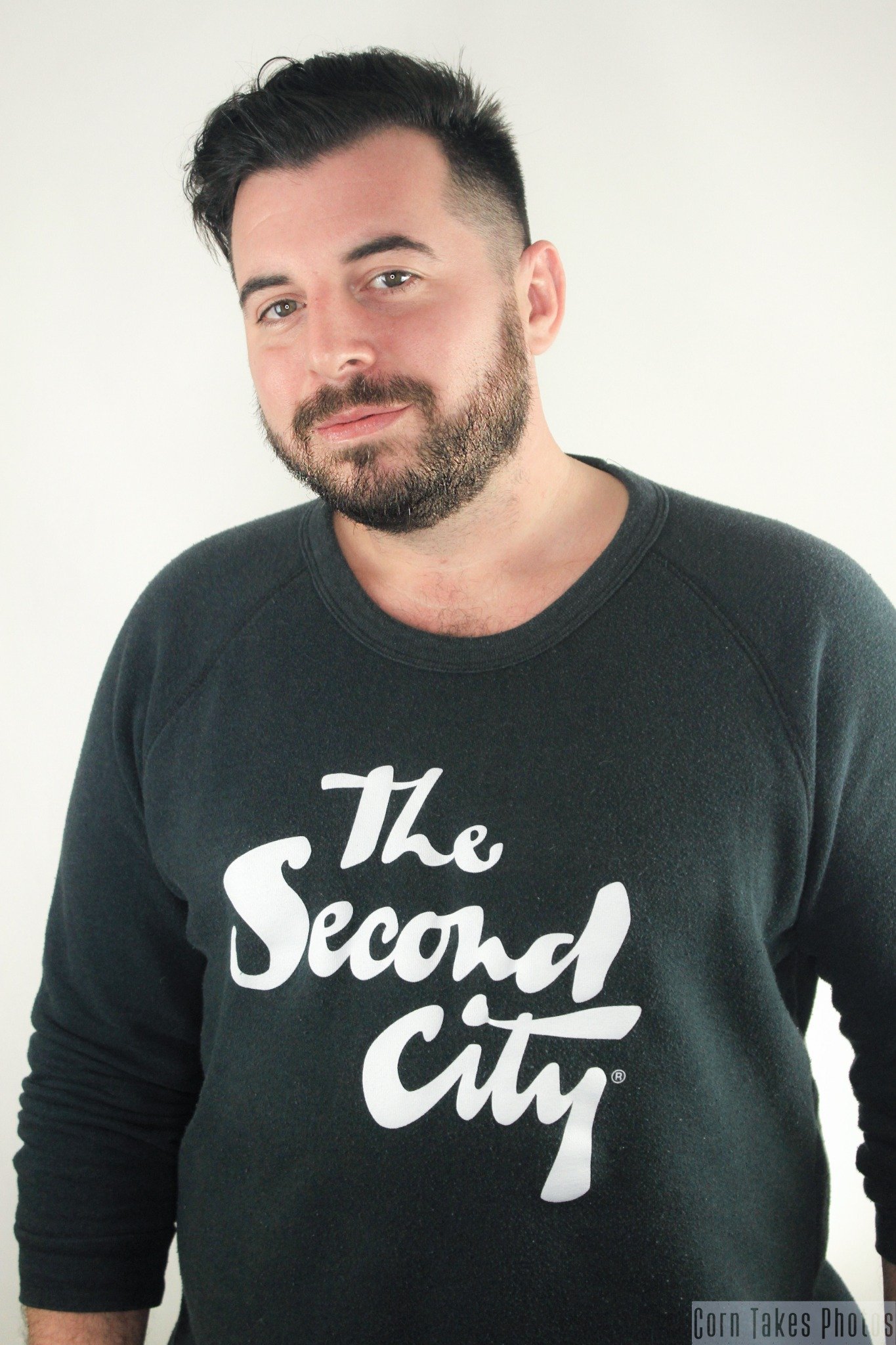Jesse Suphan wearing a Second City shirt